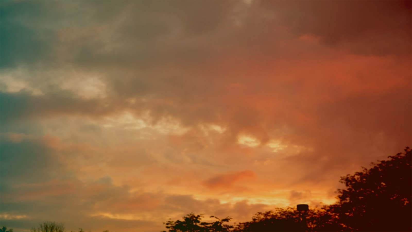 University of Nebraska Online Highschool red clouds background